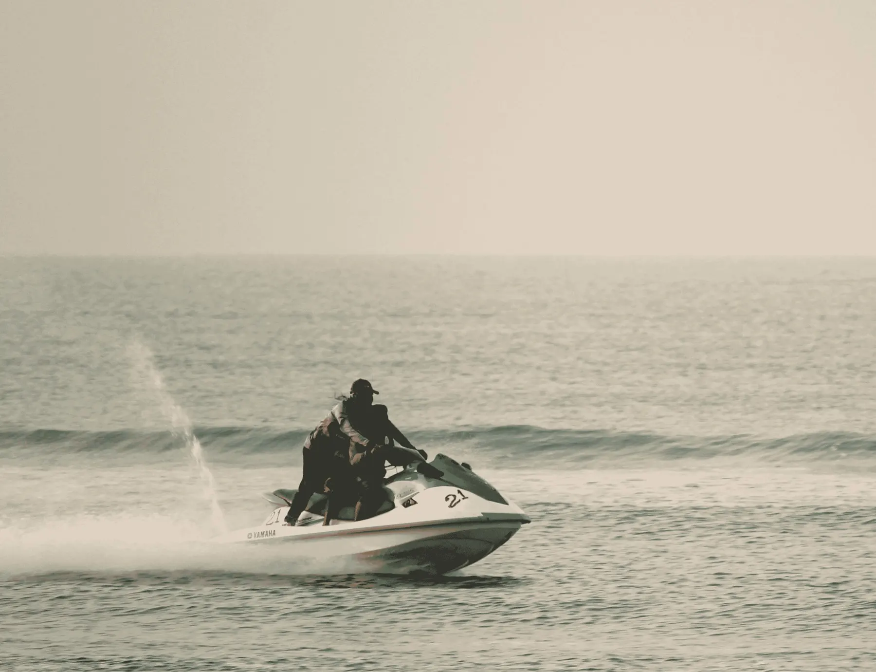 Jet ski cutting across the sea off Dapoli